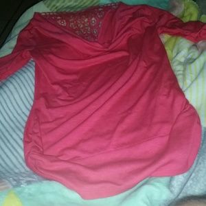 Pretty shirt it's like a red pink colored